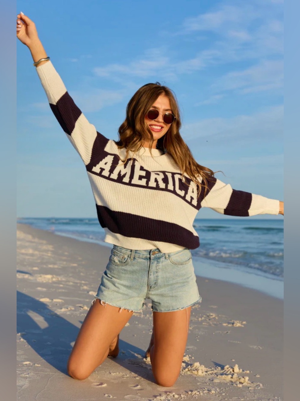 195 Le Lis Cream and Navy Striped Crewneck Sweater with 'AMERICA' Graphic